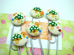 Mushroom madness Going mushroom mad again, this time with these Jumbo bookmarkers! The 1 1/8" sized mushroomy buttons are soooo cute!